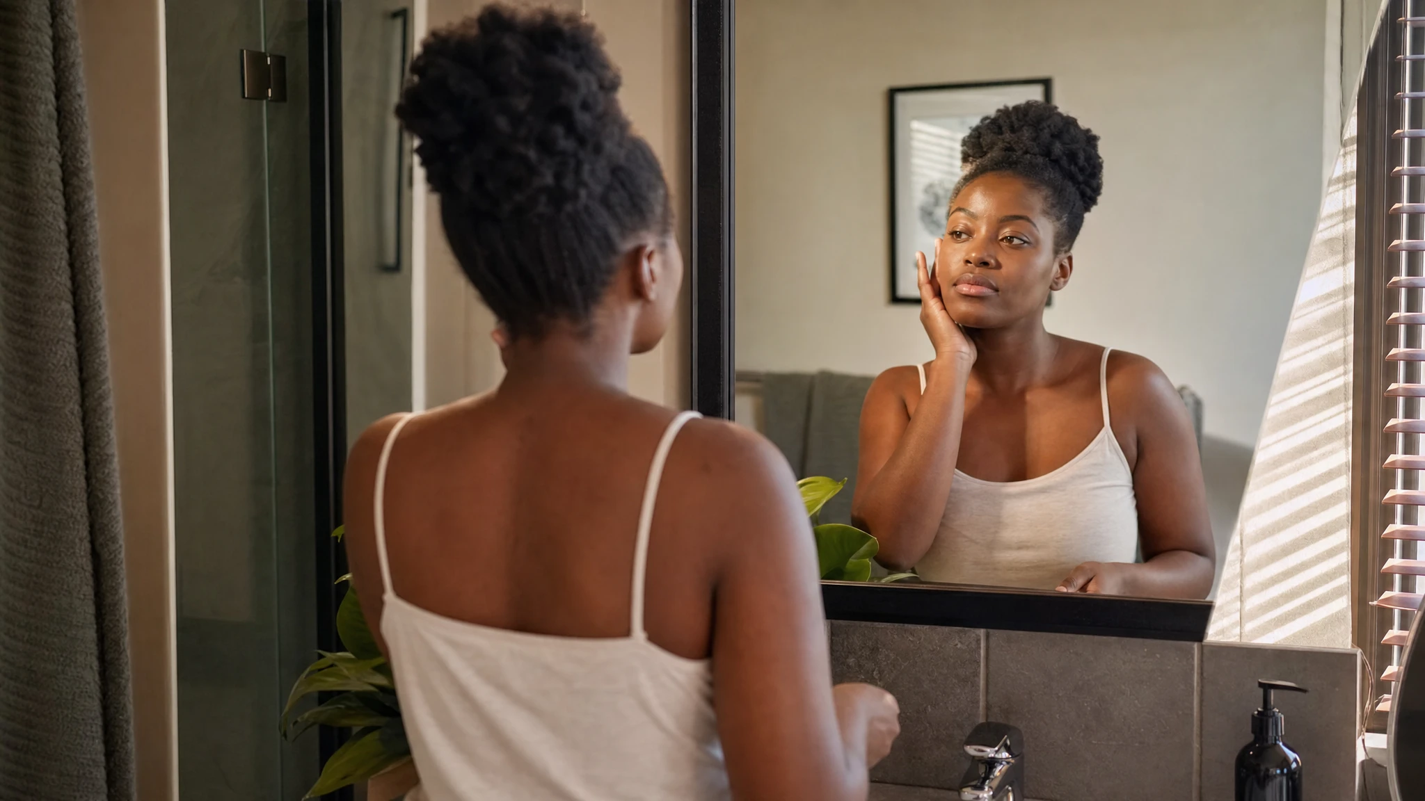 Liraglutide explained: woman in her calm morning routine at the bathroom mirror